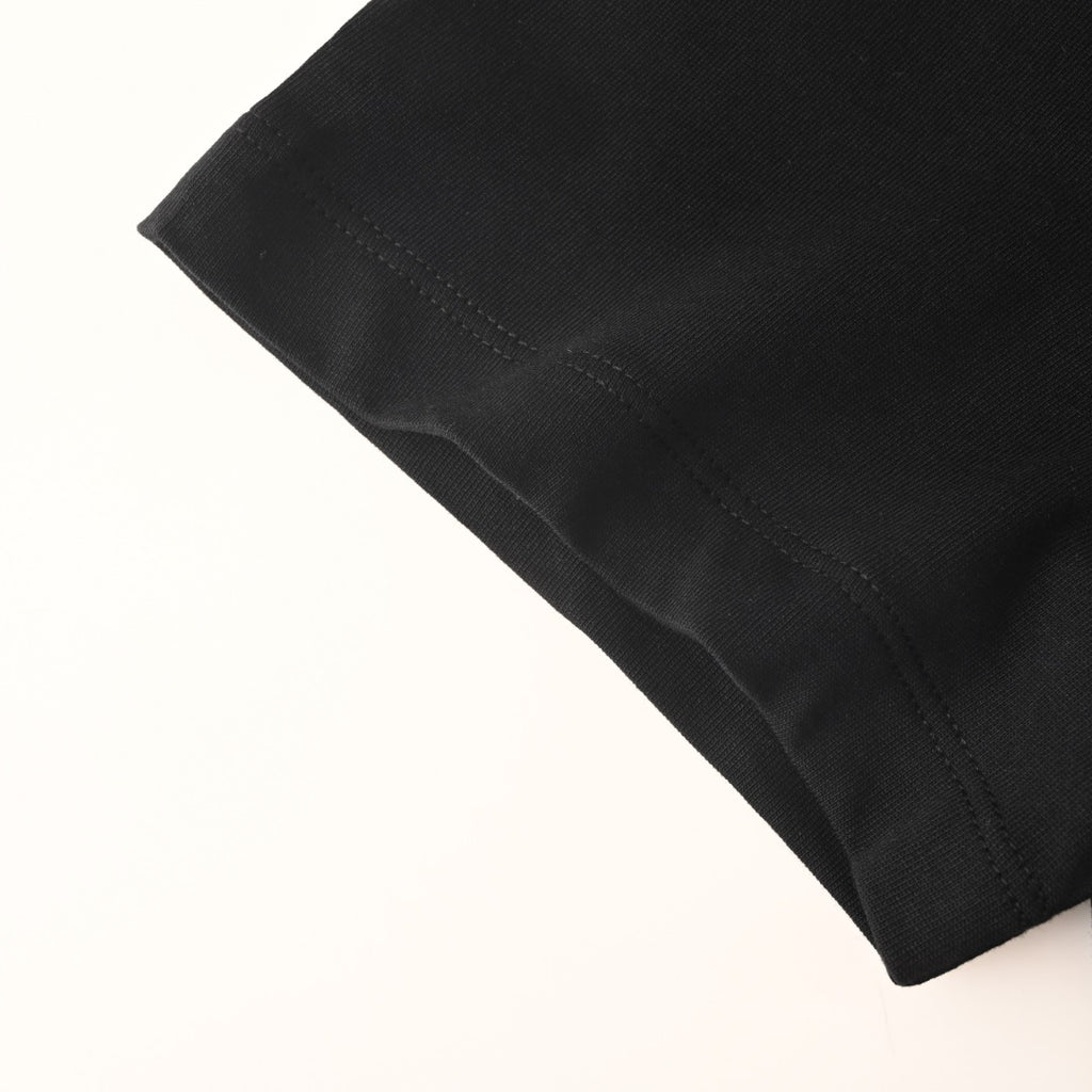 Black Versace T-shirt sleeve cuff detail with stitched seam