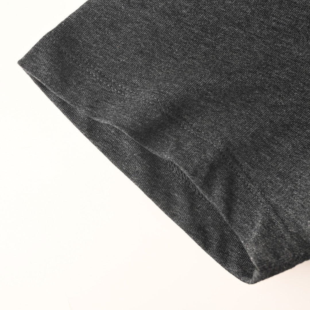 Versace T-shirt in dark gray with visible side seam and folded sleeve hem