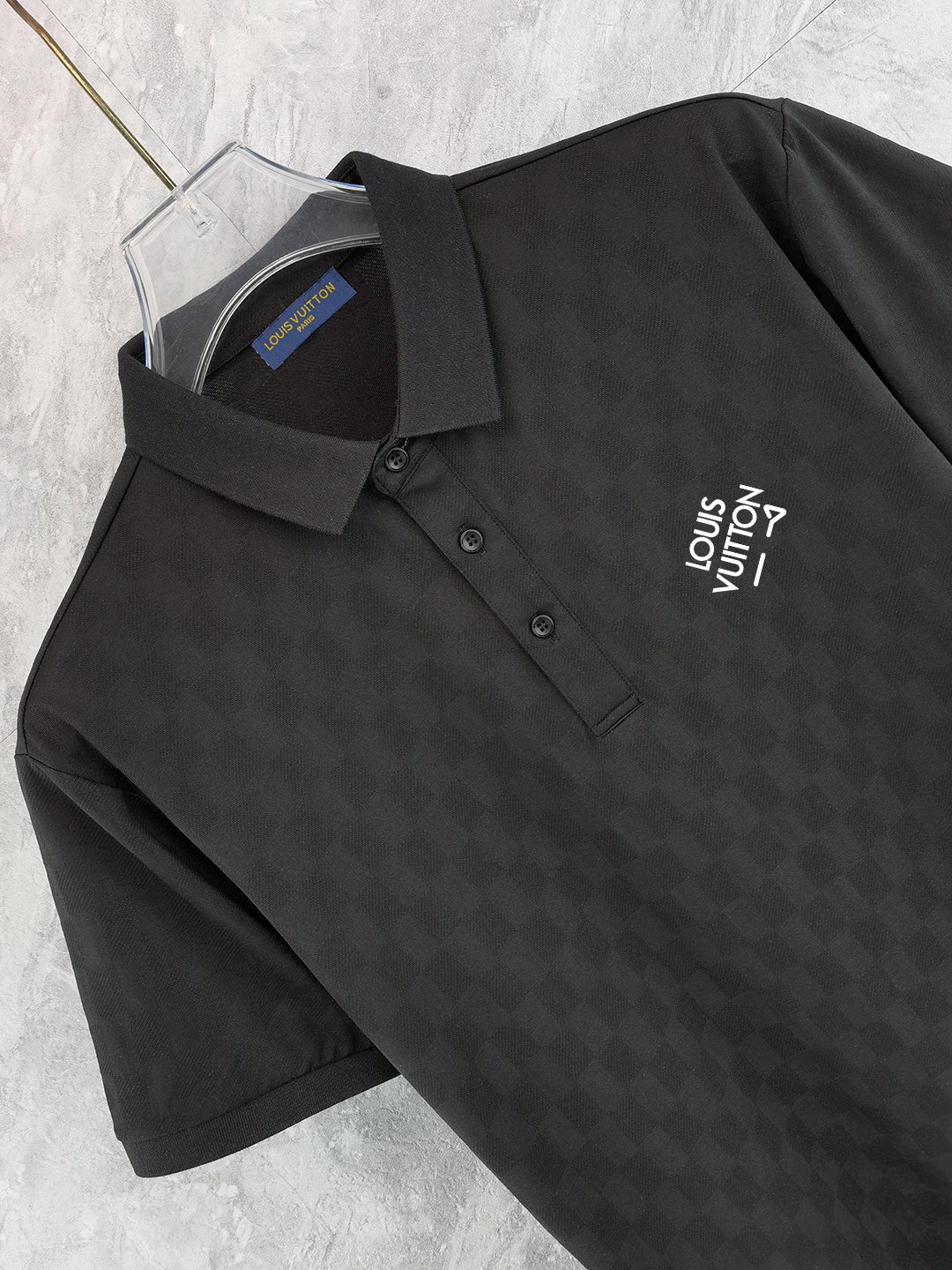 Louis Vuitton black polo shirt with collar, button placket, chest logo