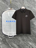 Louis Vuitton black polo shirt with collar, short sleeves, button placket, chest logo