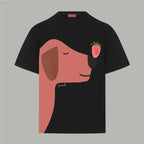 Black Gucci T-shirt with stylized face graphic and strawberry patch on the chest.