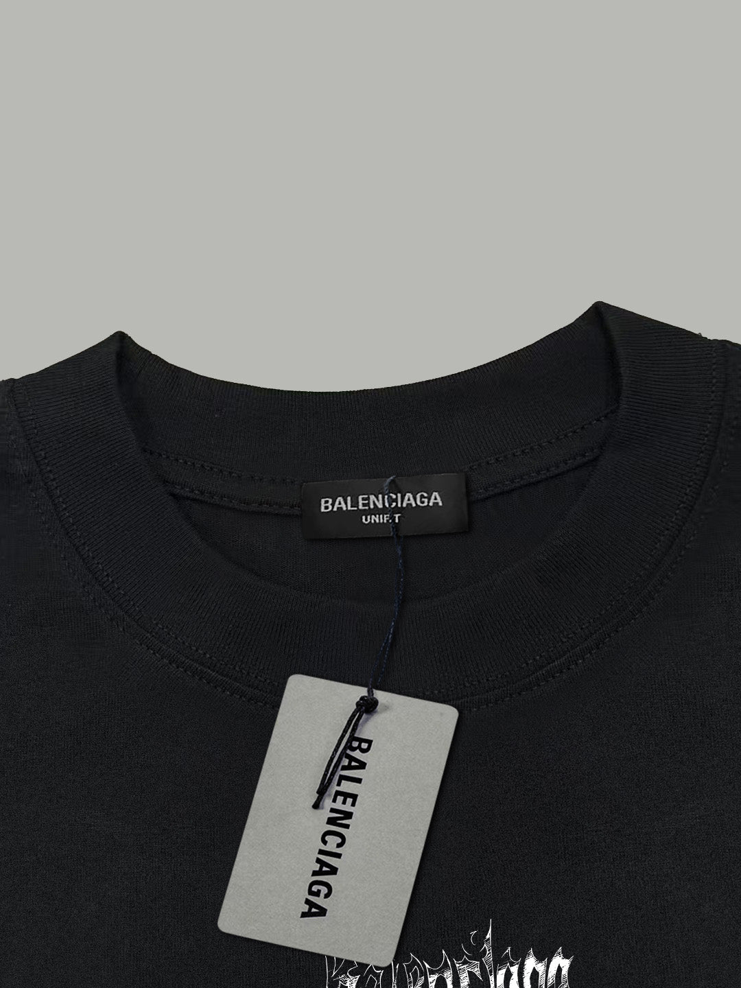 Black Balenciaga T-shirt collar with hanging size tag and neckline logo