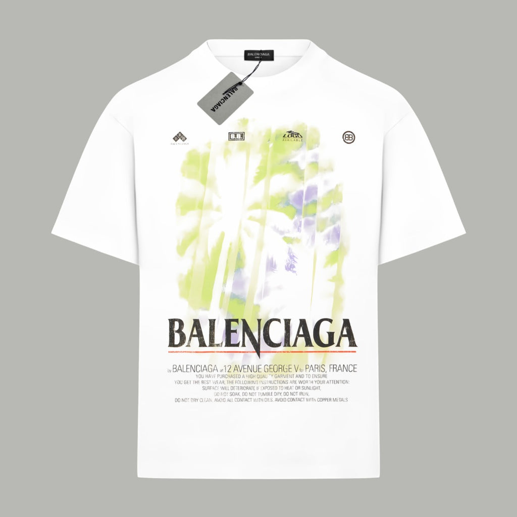 White short-sleeve T-shirt with neon green and purple abstract print and BALENCIAGA text