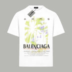 White short-sleeve T-shirt with neon green and purple abstract print and BALENCIAGA text