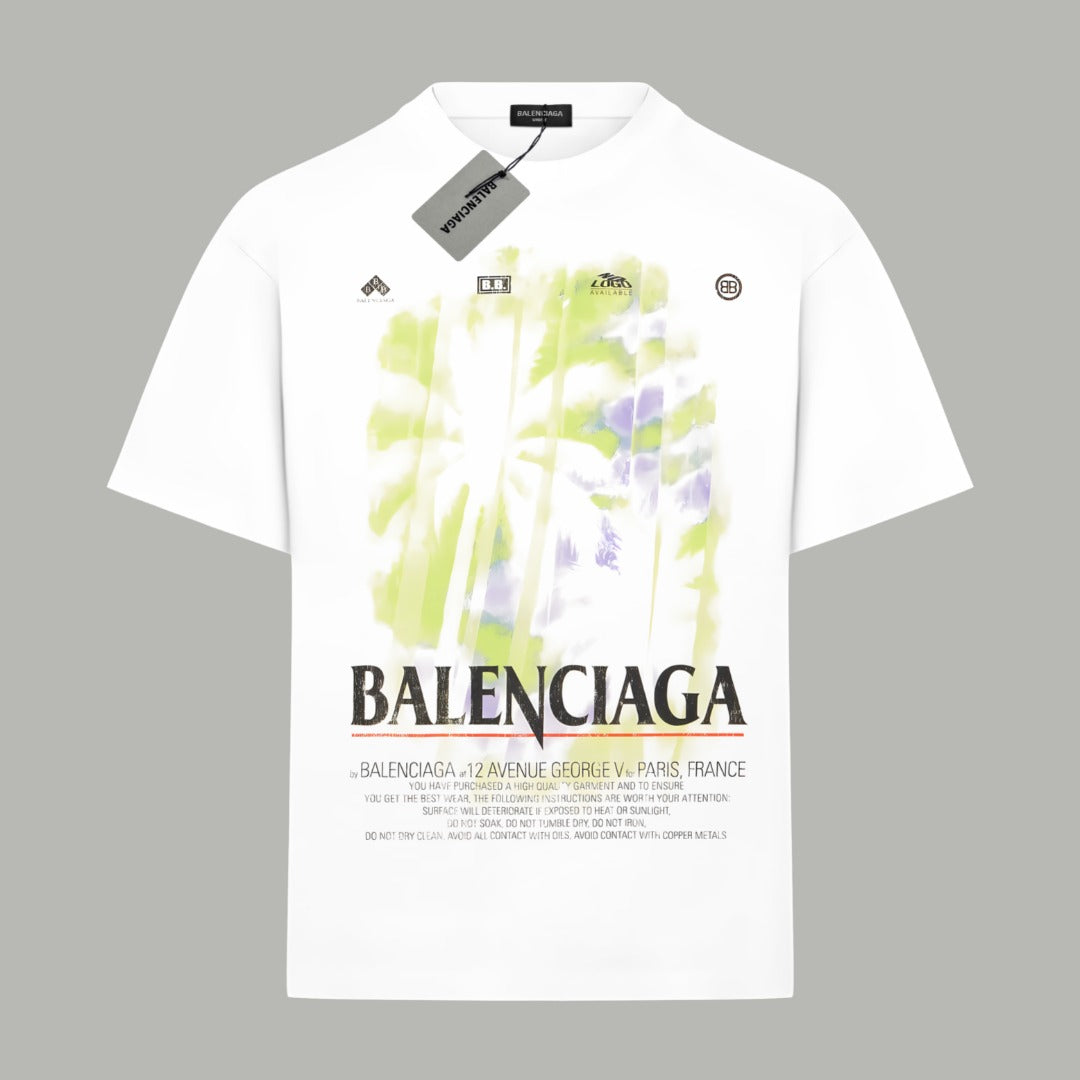 White short-sleeve T-shirt with neon green and purple abstract print and BALENCIAGA text