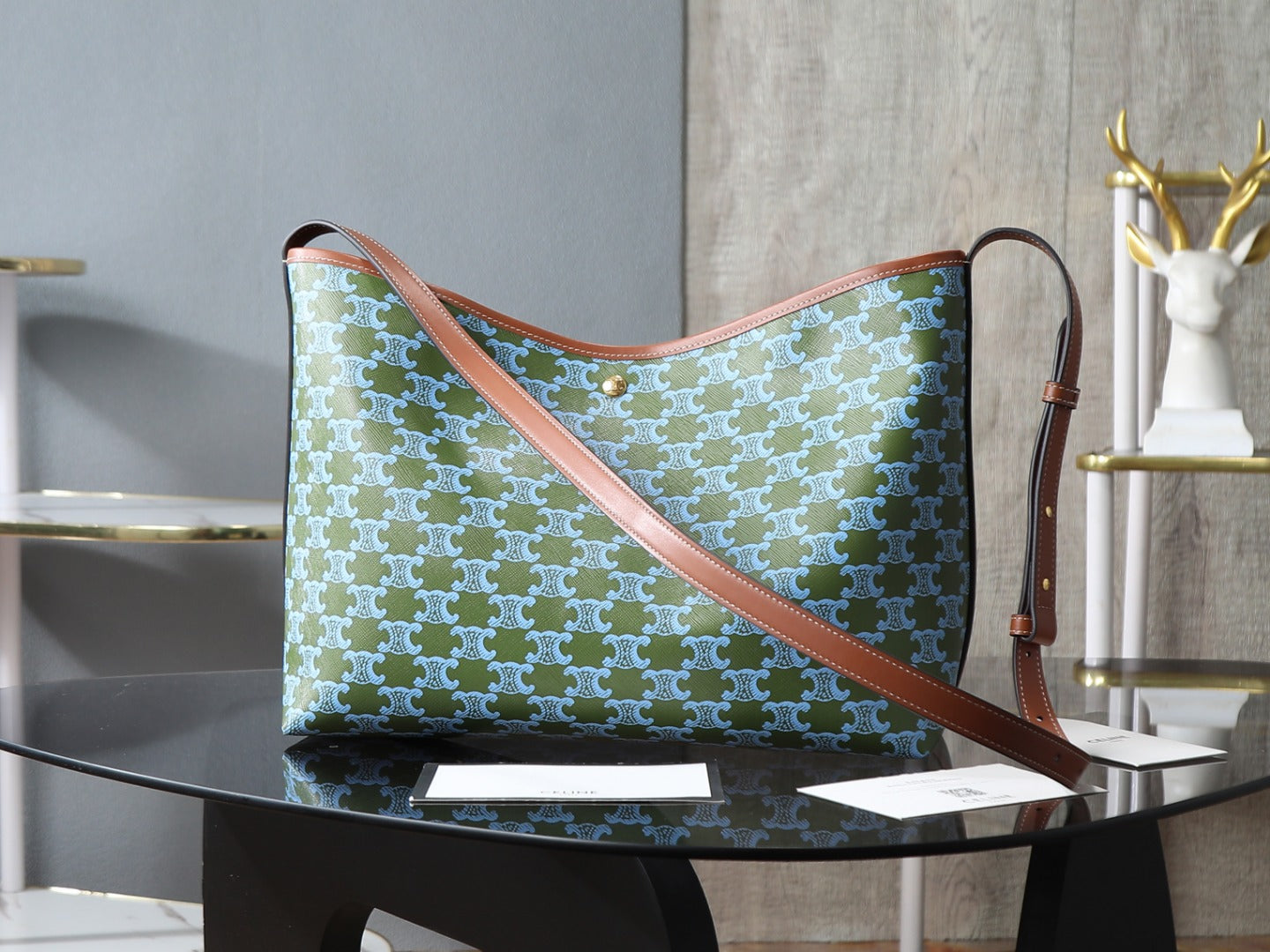 Celine green patterned shoulder bag with crossbody strap and brown accents