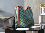 Celine patterned shoulder bag with brown handles and crossbody strap