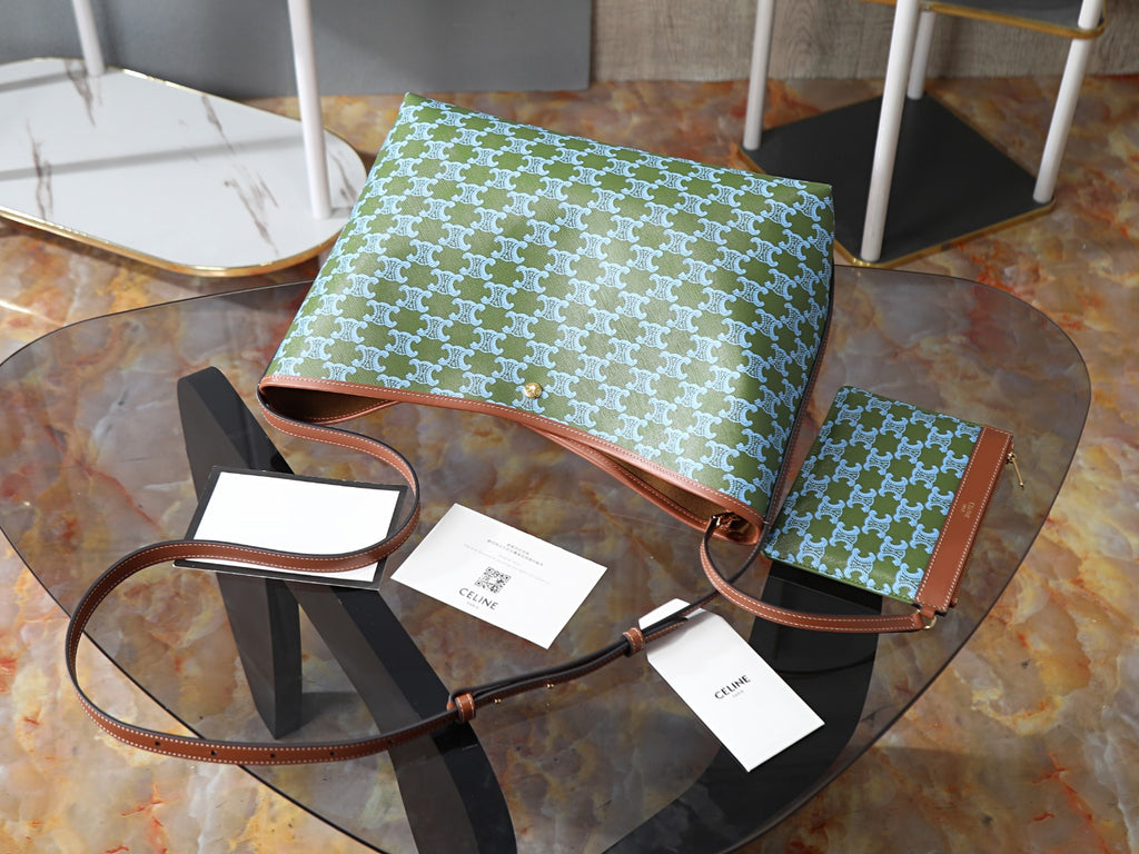 Celine patterned bag with brown strap and handle, shown with accessory tags