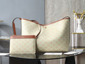 Celine tote bag with light beige monogram pattern and brown leather handles