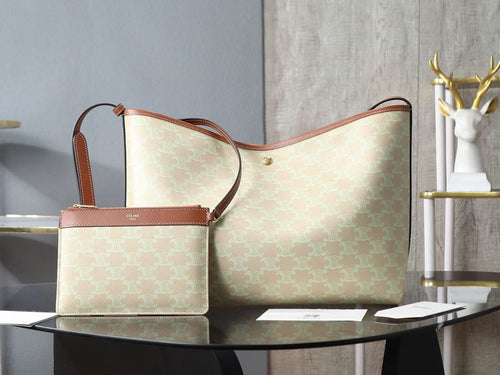 Celine tote bag with light beige monogram pattern and brown leather handles