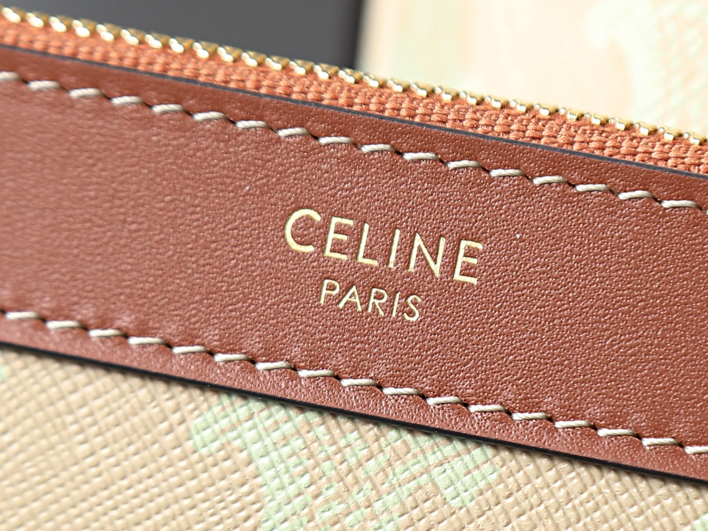 Celine Paris stamped on brown leather trim with stitched edge