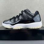 Jordan 11 lace-up sneakers with black leather-look upper, white midsole, cream outsole