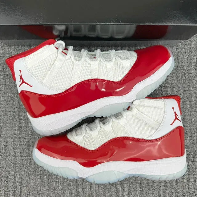 Pair of red and white high-top sneakers with thick white midsoles