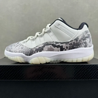 Low-top sneaker with white leather panels and snakeskin-textured side panel in gray and black
