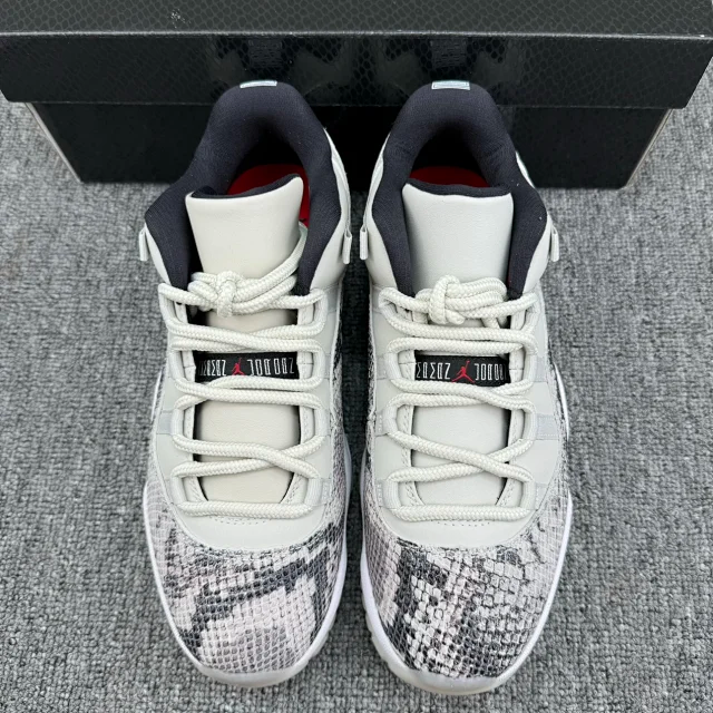 Low-top sneakers from heel, white uppers with black lining and visible lace panel detail