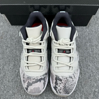 Low-top sneakers from heel, white uppers with black lining and visible lace panel detail