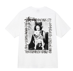 Stussy white T-shirt with central dog-and-model graphic and vertical text