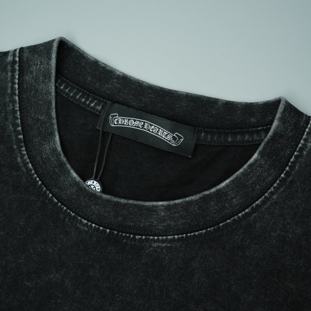 Black crewneck T-shirt neckline with interior brand tag detail