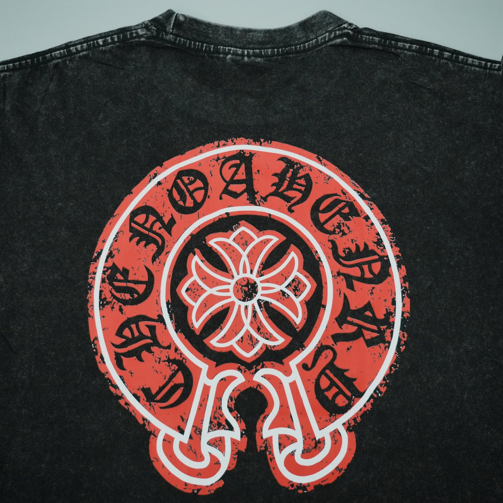 Black T-shirt back with large red circular flower graphic