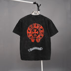 Black graphic T-shirt with large red skull emblem on the back and small logo