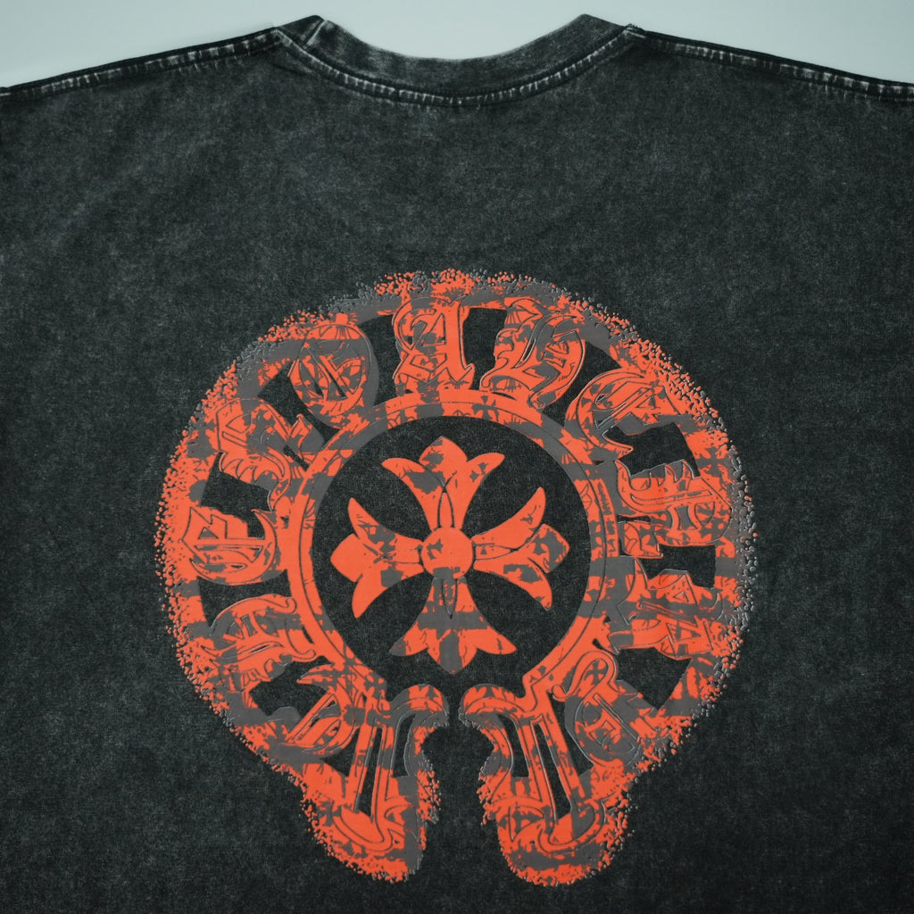 Black T-shirt with large red skull flower-style graphic on the front