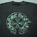 Black T-shirt with large green outline head graphic across back