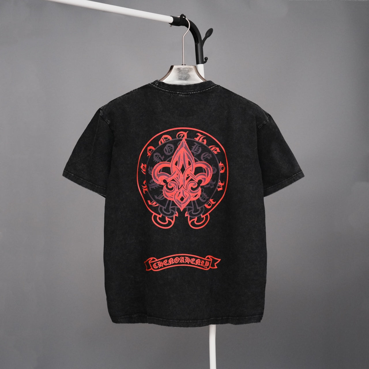 Black short-sleeve T-shirt with large red back graphic and red ribbon-style text
