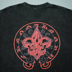 Black short-sleeve T-shirt back with large red fleur-de-lis style emblem