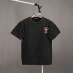 Black crewneck T-shirt with small chest graphic