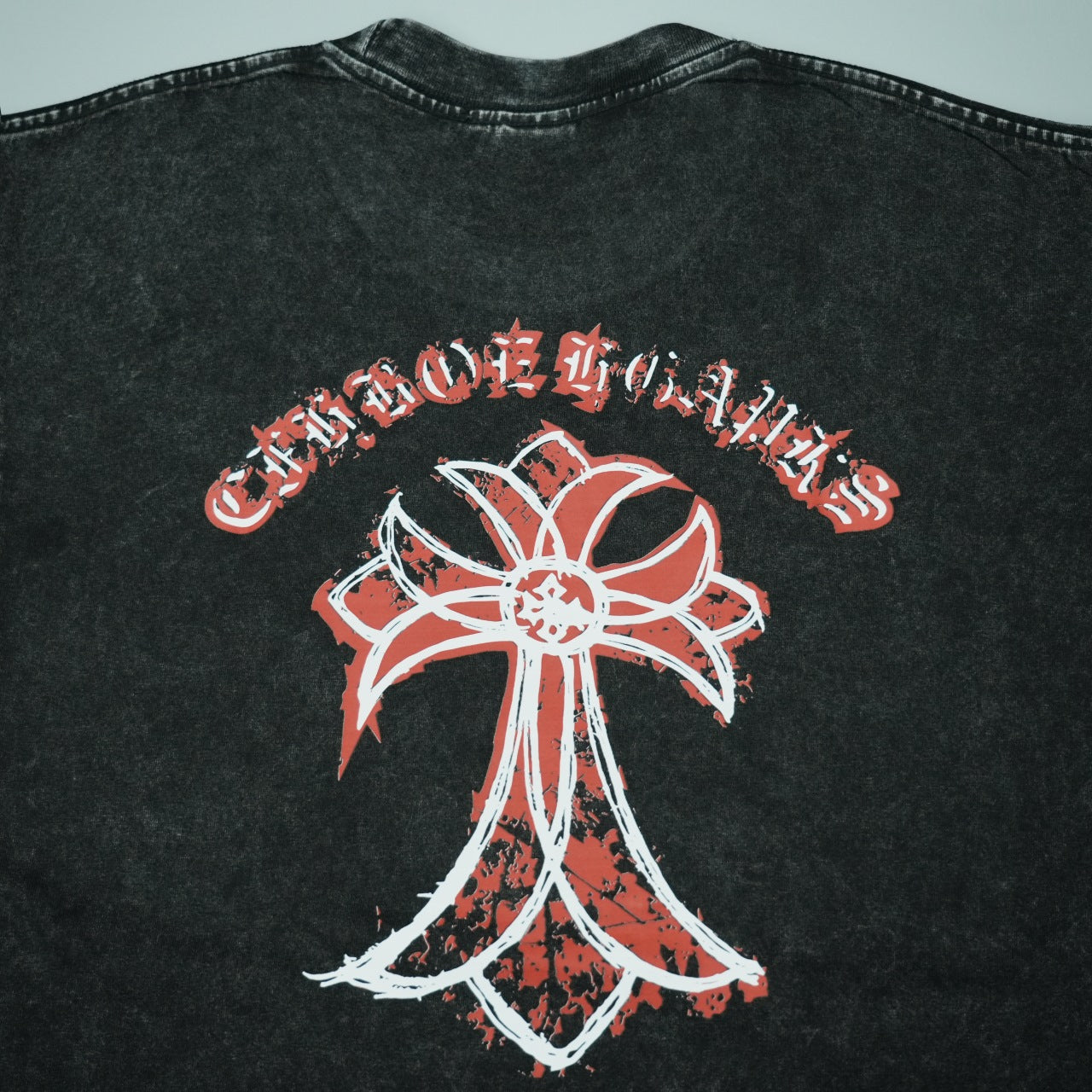 Black T-shirt back graphic with red and white design