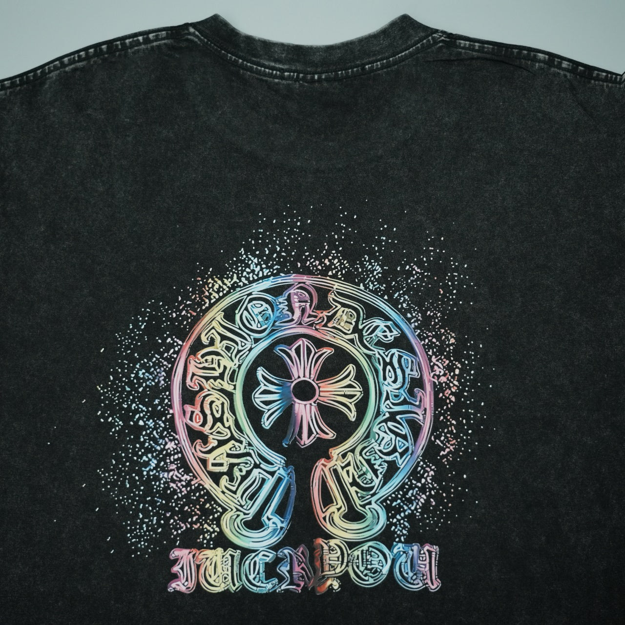 Black short-sleeve T-shirt front graphic with colorful skull design