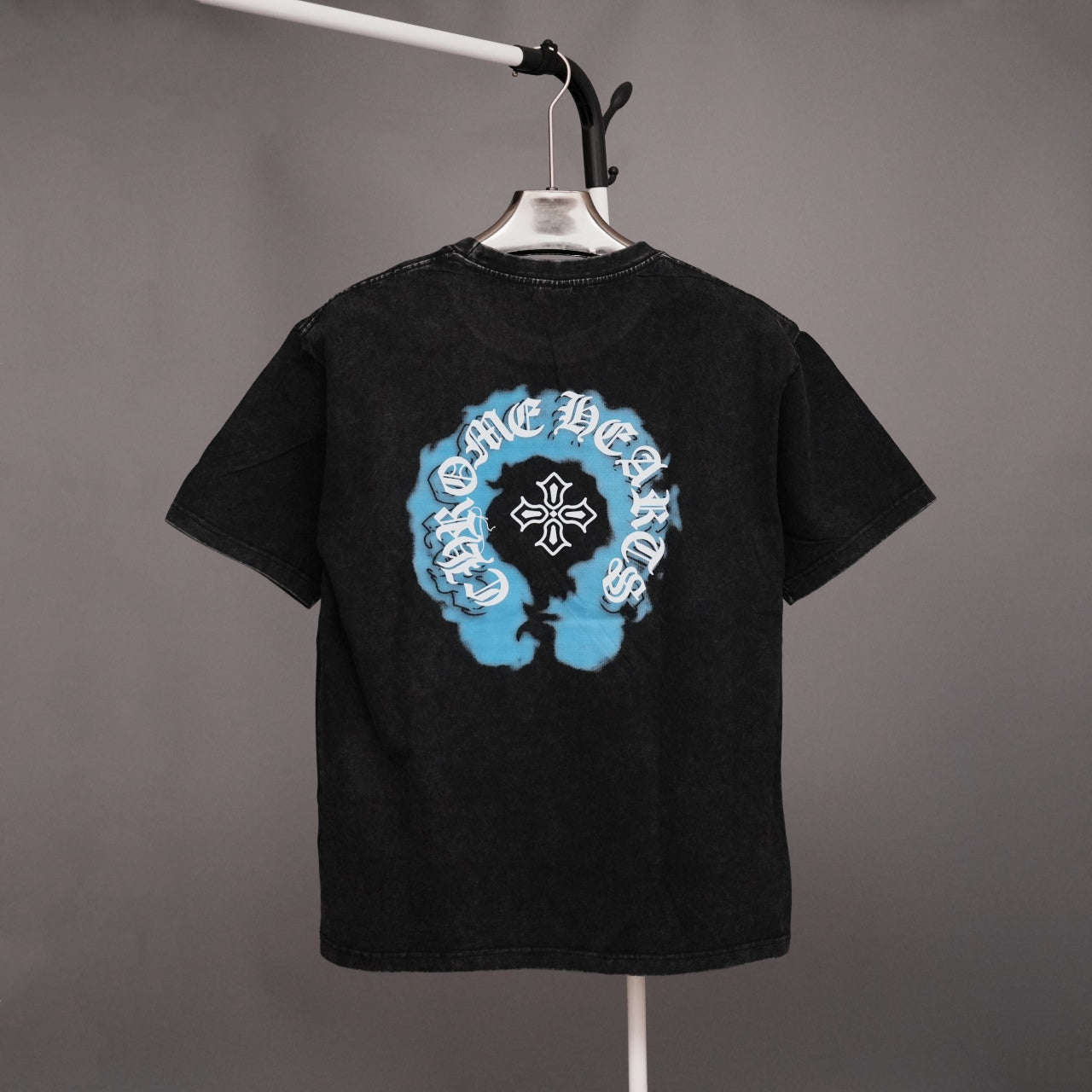 Black short-sleeve T-shirt with large blue graphic on back