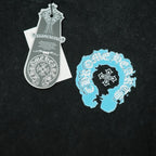 Black T-shirt with blue profile graphic print and attached hang tags