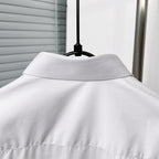 Dior long-sleeve shirt, white, raised collar detail in close-up