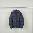 Dark navy puffer jacket with hood and button front