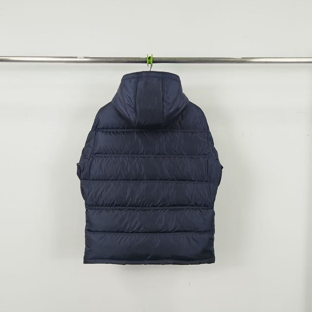 Dark navy hooded puffer jacket, back view