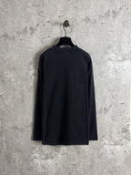 Black long-sleeve crewneck T-shirt, plain back view, hanging on a hanger