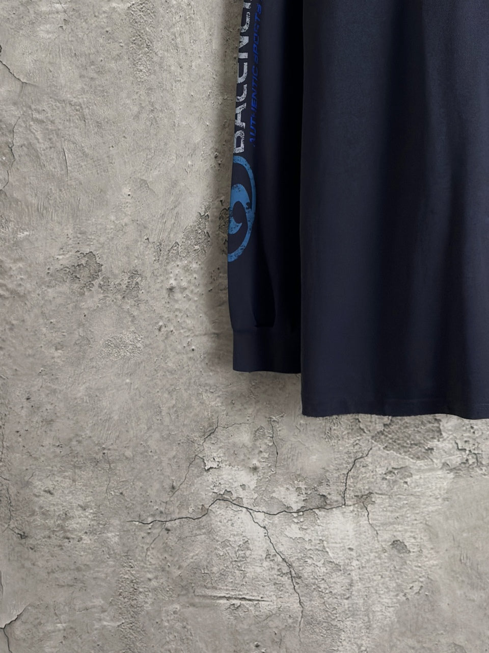 Balenciaga dark blue long-sleeve top with vertical sleeve graphic near cuff
