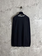 Balenciaga long-sleeve top, dark; back view with BALENCIAGA logo across neckline