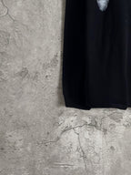 Balenciaga long-sleeve top hem and side view in dark fabric