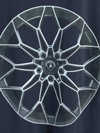 Dark blue long-sleeve T-shirt with close-up white wheel graphic across the chest.