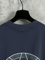 Navy long-sleeve crewneck T-shirt collar with wheel hub graphic, top view