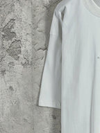 White Balenciaga short-sleeve T-shirt side view, smooth fabric with logo mark