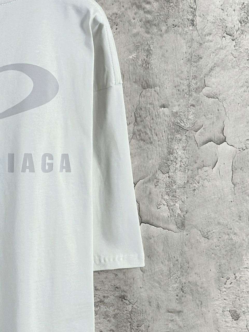 White Balenciaga T-shirt back sleeve area with heart graphic detail