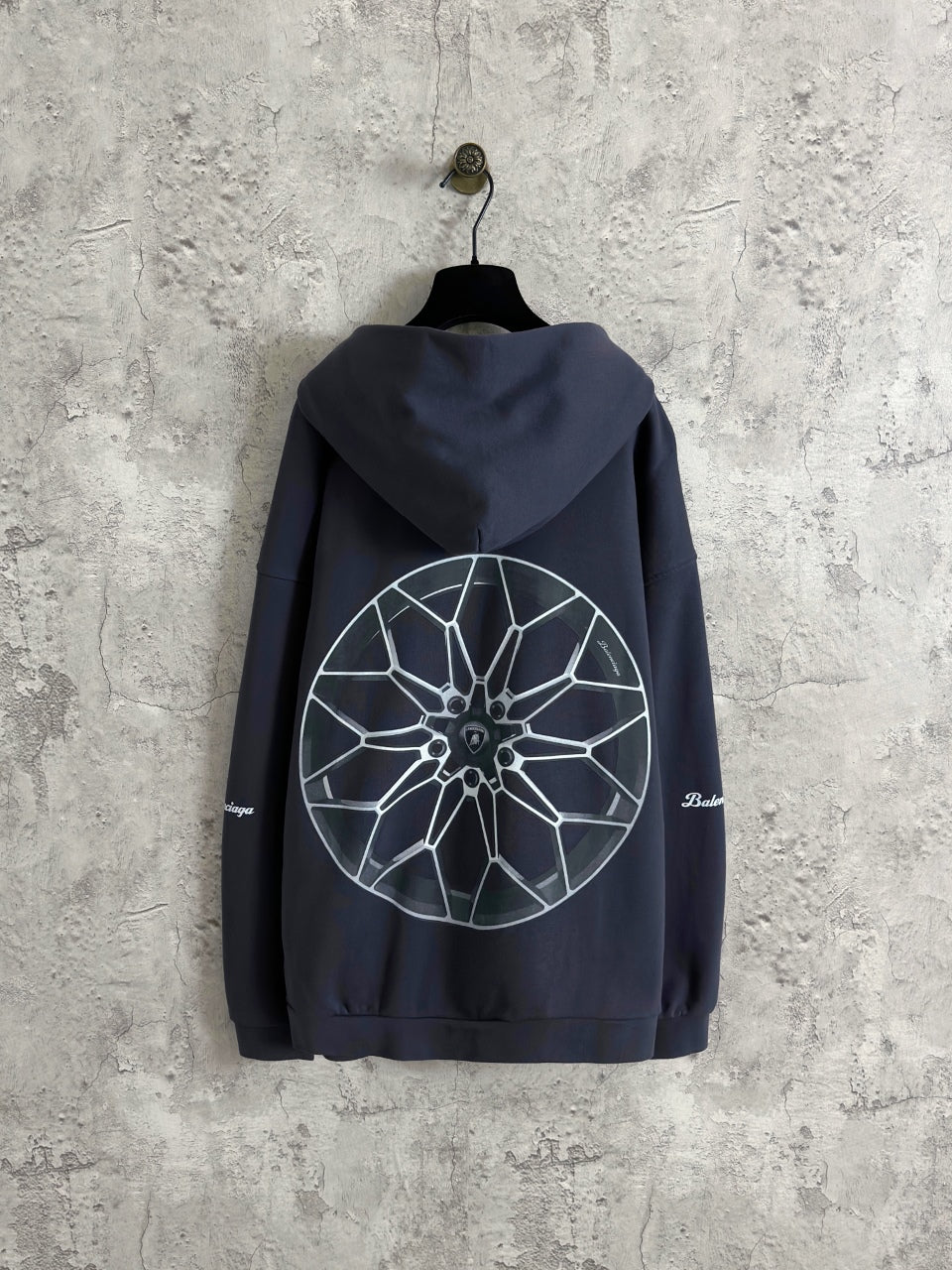 Balenciaga navy zip-up hoodie with large wheel graphic on back