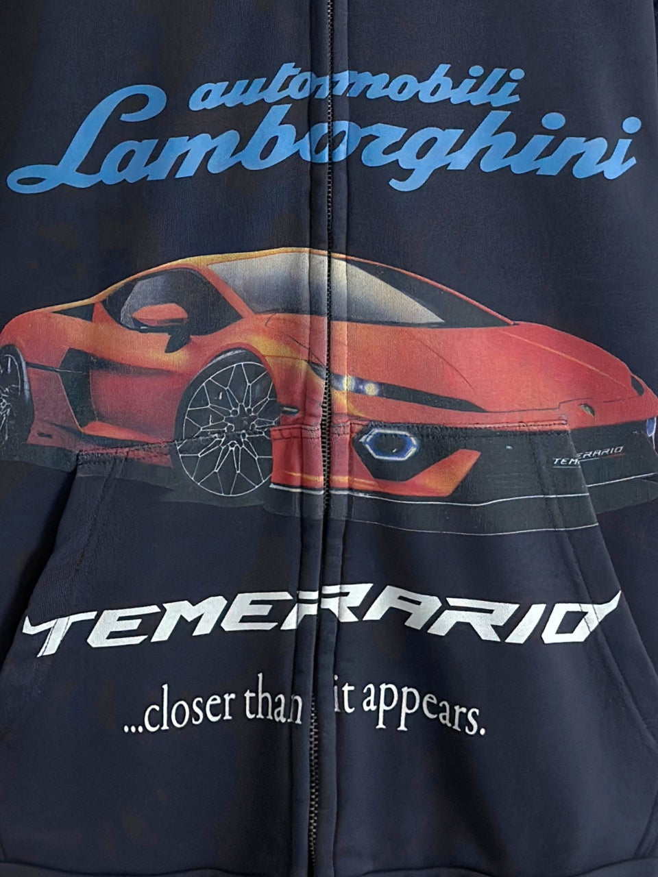 Balenciaga navy hoodie front with Lamborghini car graphic and 'TEMERARIO' text