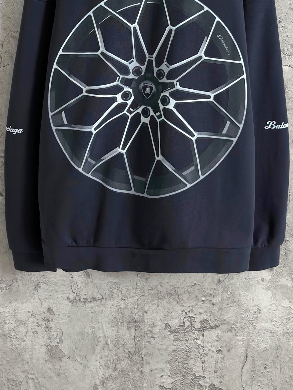 Balenciaga navy hoodie with large white wheel graphic on back