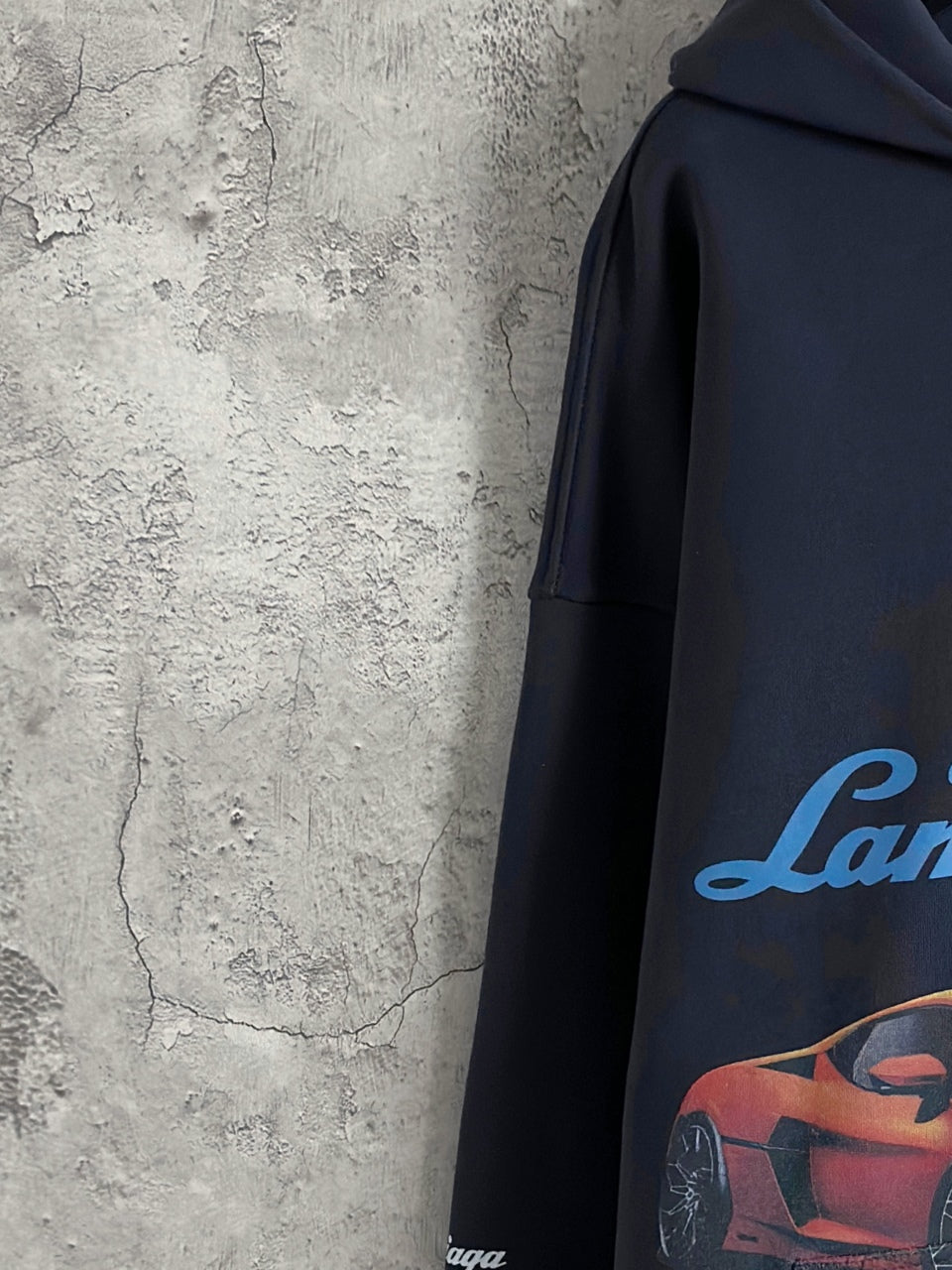 Balenciaga navy hoodie sleeve with Lamborghini script logo