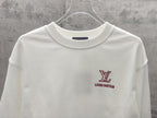 White long-sleeve sweatshirt with Louis Vuitton LV logo and text
