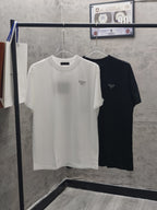 Short-sleeve T-shirt pair: white and dark with small chest logo